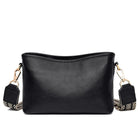 Elegante schwarze Lederhandtasche mit verstellbarem Schultergurt, ideal für Damenmode. Perfekt für Alltag und besondere Anlässe.