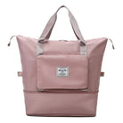 Rosa Reisetasche mit großem Hauptfach, Fronttasche und robusten Tragegriffen. Perfekt für Reisen, Sport und Alltag. Hochwertiges, stilvolles Design.