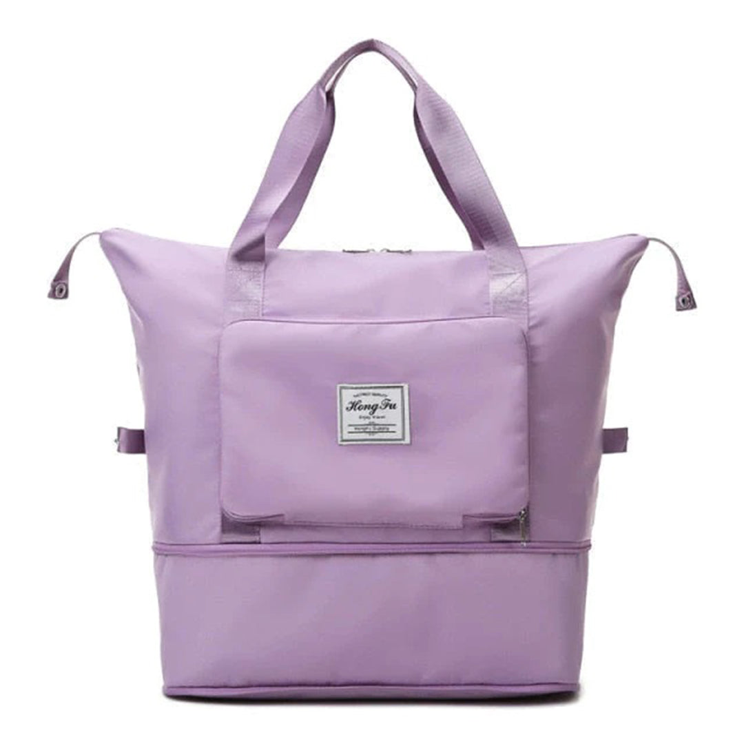 Lila Reisetasche mit großem Hauptfach, robustem Reißverschluss und verstellbaren Trägern. Perfekt für Reisen, Sport und Alltag.