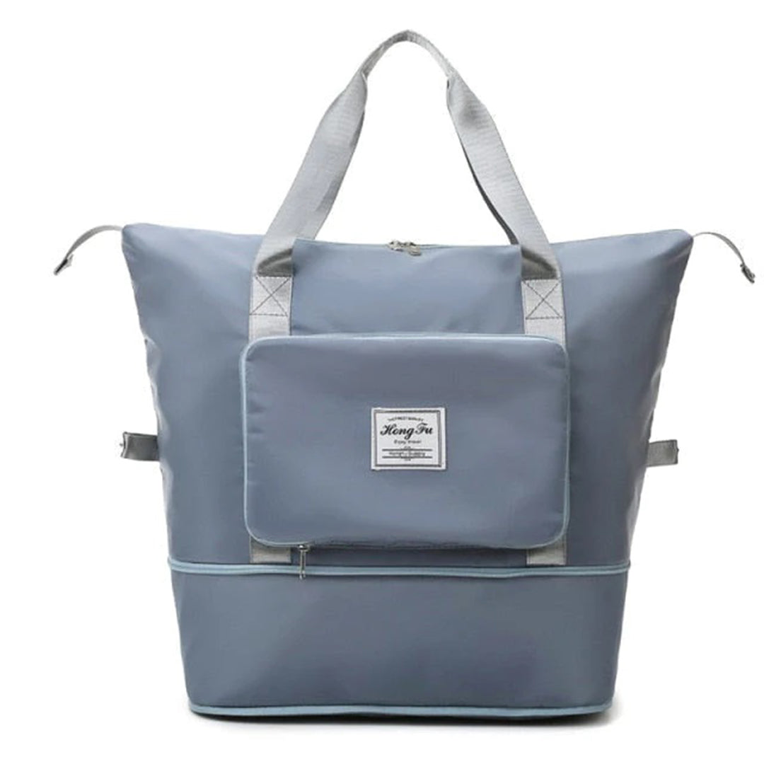 Große blaue Reisetasche mit robusten Tragegriffen, Fronttasche und Reißverschluss. Perfekt für Reisen, Sport und Alltag. Hochwertiges Material.