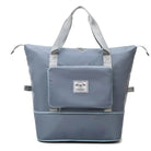 Große blaue Reisetasche mit robusten Tragegriffen, Fronttasche und Reißverschluss. Perfekt für Reisen, Sport und Alltag. Hochwertiges Material.