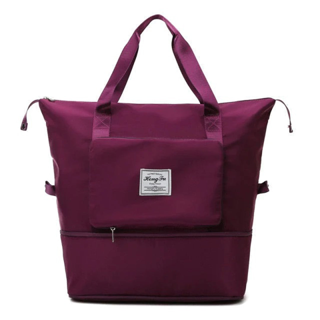 Lila Reisetasche mit großem Hauptfach, robustem Reißverschluss und Tragegriffen. Perfekt für Reisen, Sport und Alltag. Hochwertiges Material.