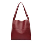 Elegante rote Ledertasche mit langen Trägern, ideal für Damen. Hochwertige Handtasche, perfekt für Alltag und Büro. Modisches Accessoire.
