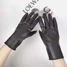 Schwarze Lederhandschuhe für Damen, elegant und stilvoll, ideal für Herbst und Winter. Perfekt für Modebewusste und als Geschenkidee.
