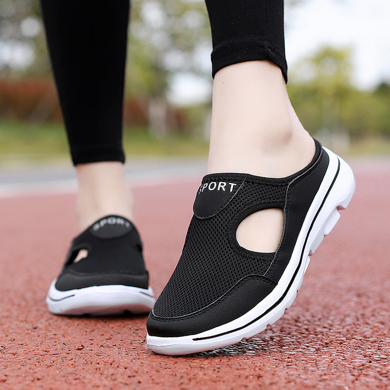 Schwarze Damen-Sportschuhe mit atmungsaktivem Mesh, rutschfester Sohle und modernem Design. Perfekt für Laufen und Freizeitaktivitäten.