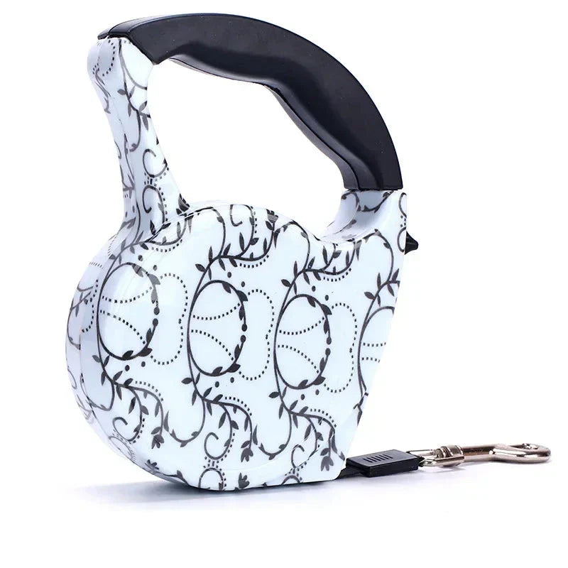 Ausziehbare Hundeleine, weiß mit schwarzem Muster, ergonomischer Griff, für Hunde.