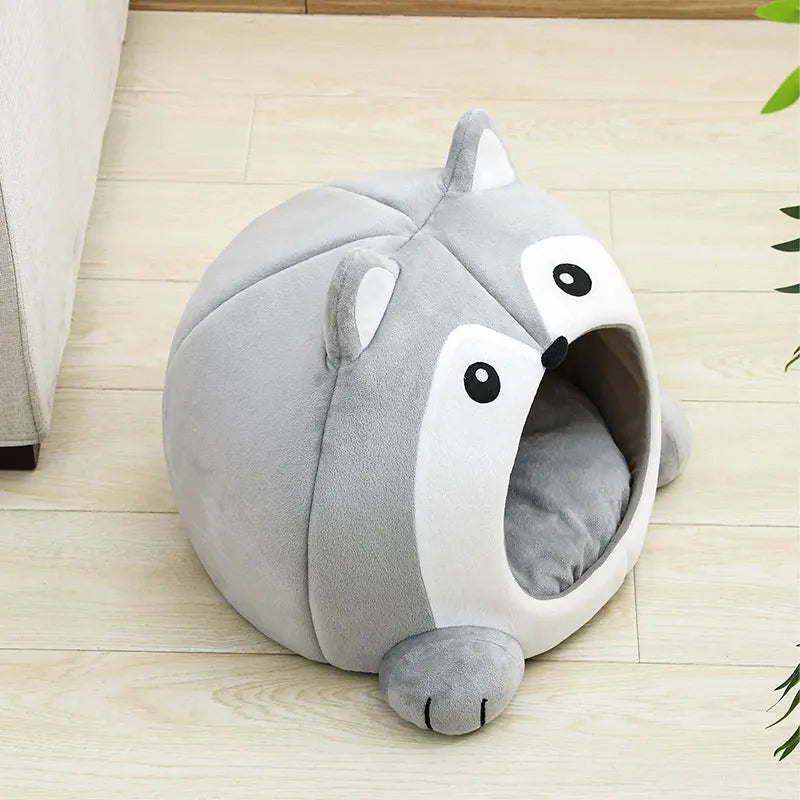 Graues Katzenbett in Tierform, Plüsch, rund, gemütlich, für Haustiere, modernes Design.