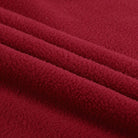 Roter Fleece-Stoff, weich und kuschelig, ideal für Nähprojekte und Bekleidung. Perfekt für warme Decken und Wintermode. Hochwertige Textur.
