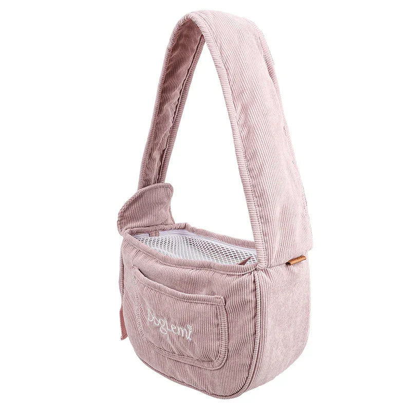 Rosa Hundetragetasche aus Cord mit Netzabdeckung, verstellbarem Schultergurt, ideal für Reisen.