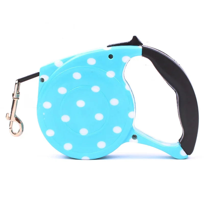 Blaue Hundeleine mit weißen Punkten, ausziehbar, ergonomischer Griff, Haustierzubehör.