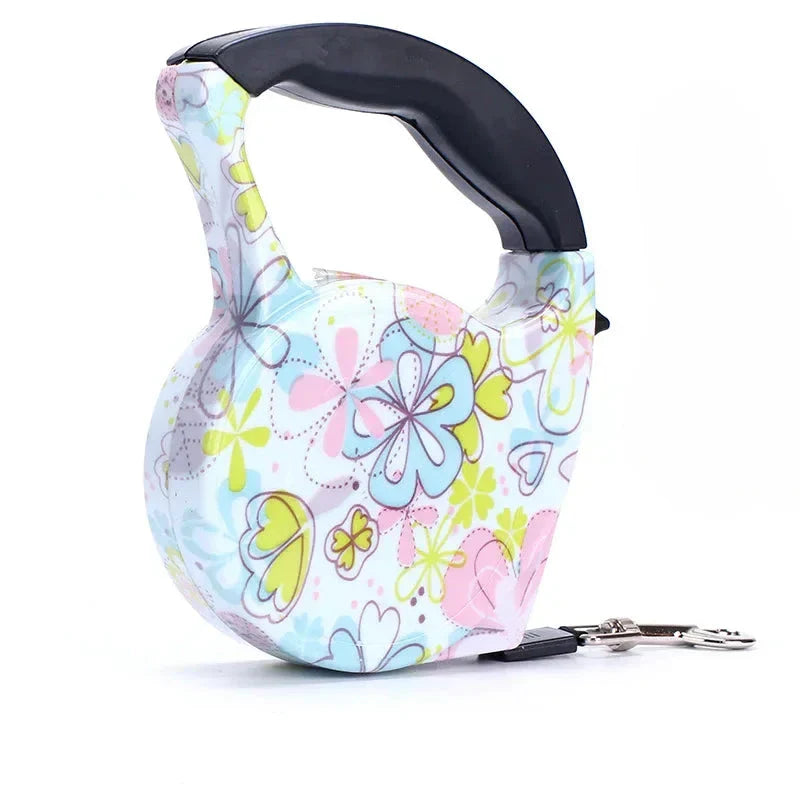 Bunte Hundeleine mit Blumenmuster, ausziehbar, ergonomischer Griff, für Spaziergänge.