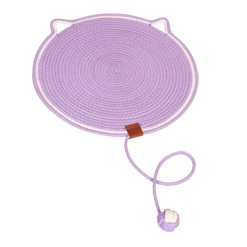 Lila Katzenkratzmatte aus Seil mit Spielball, rund, robust, für Katzenunterhaltung.