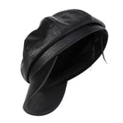 Schwarze Leder-Schiebermütze, stilvoll und zeitlos, ideal für Herrenmode. Perfekt für urbane Outfits und modische Accessoires.