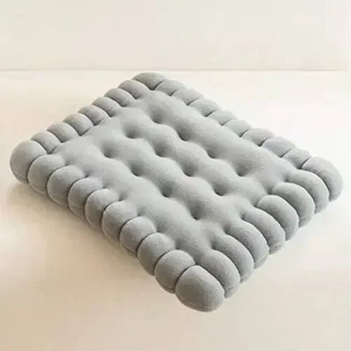Graues orthopädisches Kissen, ergonomisch, wellenförmig, für Nackenunterstützung.