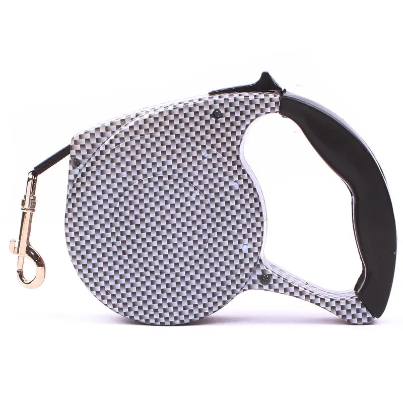 Schwarz-weiße, ausziehbare Hundeleine mit Karabinerhaken, ergonomischer Griff, robustes Design.