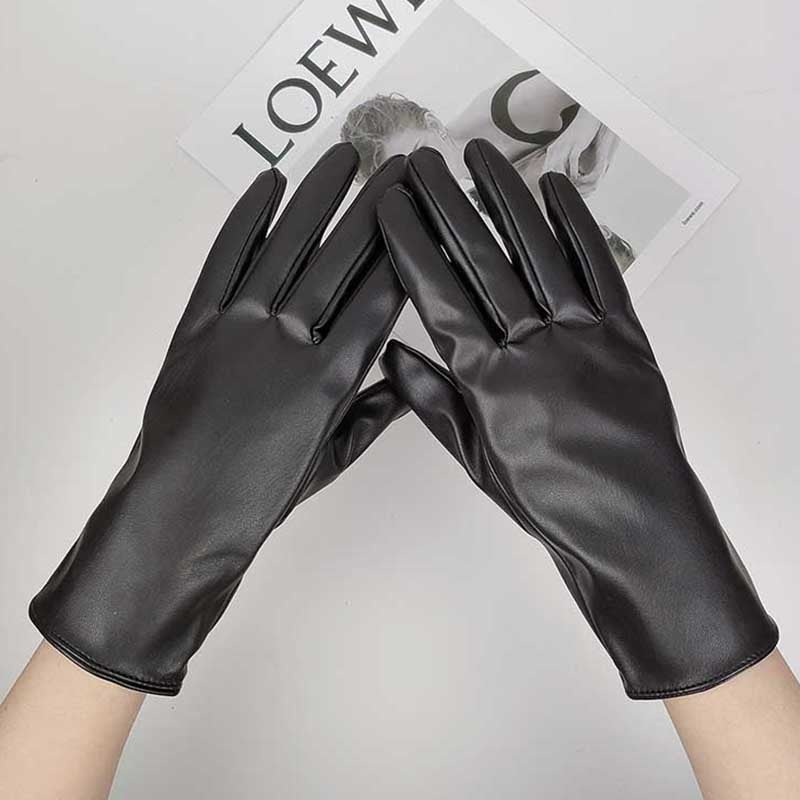 Schwarze Lederhandschuhe, elegant und stilvoll, ideal für Herbst und Winter. Perfekt für Modebewusste, die Komfort und Luxus suchen.