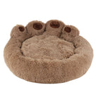 Kuscheliges, rundes Hundebett in Pfotenform, braun, Plüschmaterial, ideal für Haustiere.