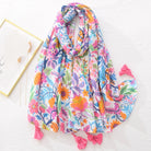 Bunter Schal mit floralen Mustern und Quasten, ideal für Frühling und Sommer. Modisches Accessoire, das jedes Outfit aufwertet.
