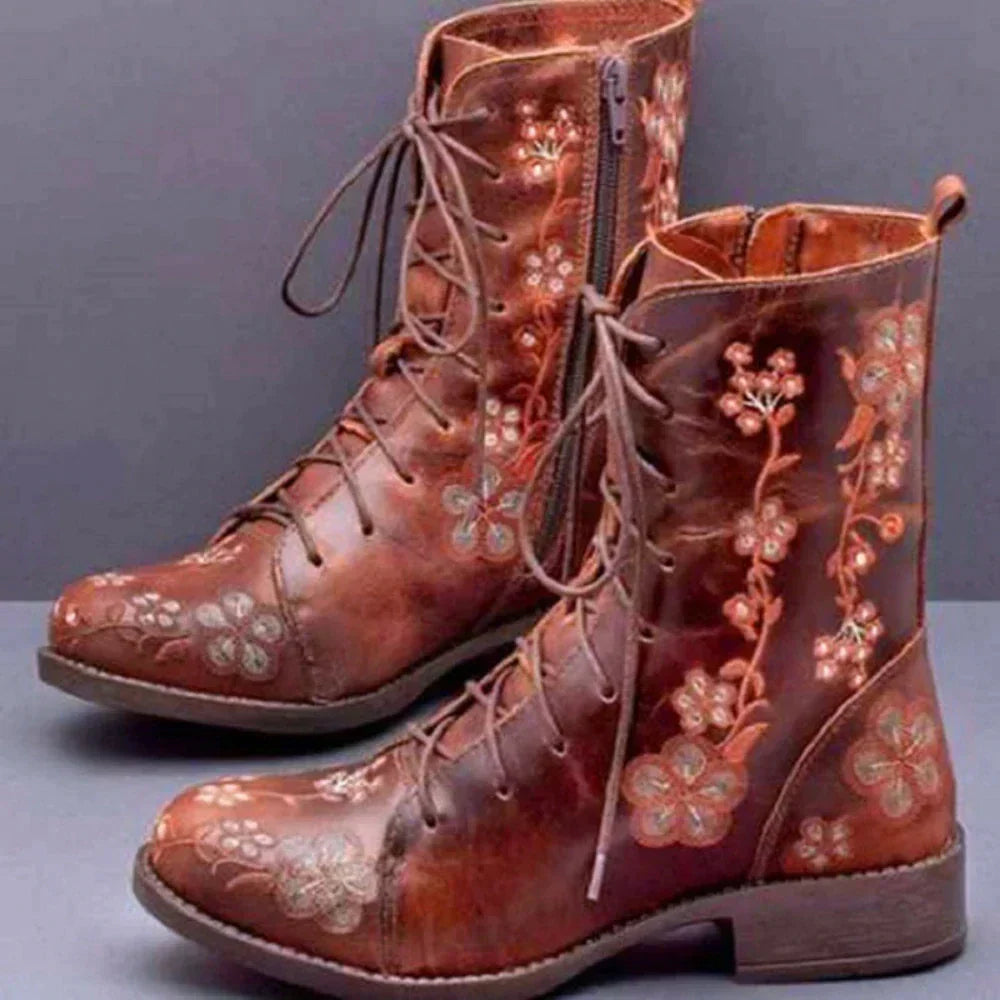 Damenstiefel aus Leder mit floralen Stickereien, braun, Schnürung, Reißverschluss, modisch, bequem, ideal für Herbst und Winter.