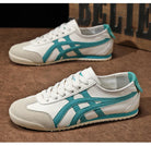 Weiße Sneaker mit türkisfarbenen Streifen, sportliches Design, ideal für Freizeit und Sport, bequeme Passform, trendige Turnschuhe für Damen und Herren.