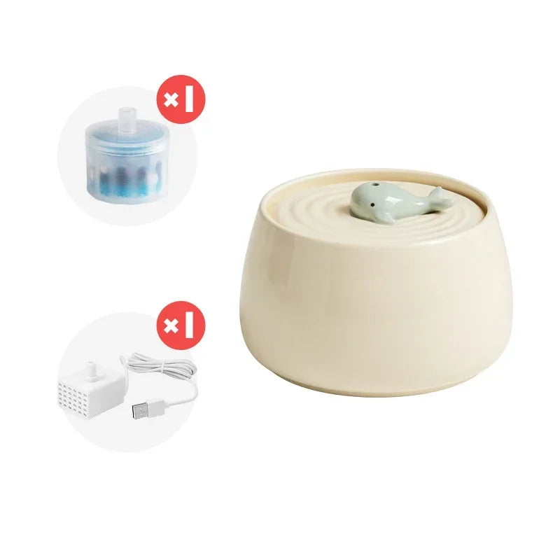 Keramik-Trinkbrunnen für Haustiere mit Wal-Design, inklusive Filter und USB-Kabel. Ideal für Katzen und kleine Hunde. Geräuscharm und stilvoll.