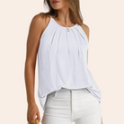 Damen-Top in Weiß, ärmellos, mit Rundhalsausschnitt. Perfekt für Sommermode, lässiger Look, vielseitig kombinierbar. Ideal für Freizeit und Alltag.