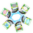 Sechseckige Verpackung mit bunten Mustern, Geschenkboxen, grün, blau, rosa, Kuhmotiv.