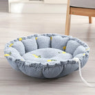Graues, rundes Haustierbett aus Plüsch mit gelben Akzenten, ideal für Katzen und kleine Hunde.
