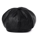 Schwarze Leder-Baskenmütze, stilvoll und zeitlos, ideal für modische Outfits. Perfekt für Herbst- und Wintermode. Hochwertige Materialien.