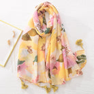 Bunter Damen-Schal mit floralem Muster, weichem Stoff und Quasten. Perfekt für Frühling und Sommer. Modisches Accessoire für jeden Anlass.
