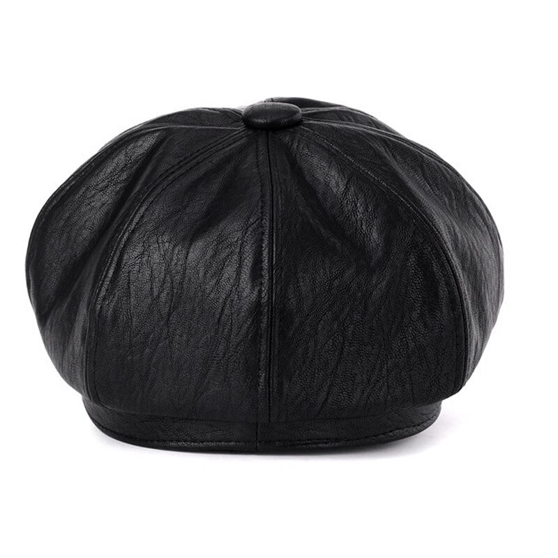 Schwarze Leder-Baskenmütze, stilvoll und zeitlos, ideal für modische Outfits. Perfekt für Herbst- und Wintermode. Hochwertiges Accessoire.