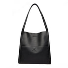 Elegante schwarze Ledertasche, minimalistisch und stilvoll, ideal für Damen. Perfekt für Alltag und Büro. Hochwertige Handtasche kaufen.