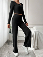 Damen Zweiteiler Set, schwarz, langärmeliges Oberteil und weite Hose, modern und elegant, ideal für Freizeit und Büro, stilvoll und bequem.