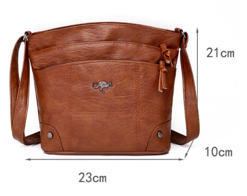 Damen-Ledertasche in Braun, 23x21x10 cm. Stilvolle Umhängetasche mit Känguru-Logo, ideal für Alltag und Freizeit. Hochwertiges Design.