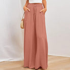 Damenhose in Rosa, weit geschnitten, mit elastischem Bund und Kordelzug. Perfekt für Sommermode, lässiger Stil, bequem und stilvoll.