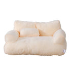 Beige Plüschsofa für Haustiere, gemütlich, weich, ideal für Katzen und kleine Hunde.