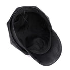 Schwarze Lederkappe, innenansicht, modisch und robust. Perfekt für stilvolle Outfits. Hochwertiges Material, ideal für jede Jahreszeit.