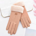 Damenhandschuhe aus Wildleder mit weichem Kunstfellfutter, elegant und warm, ideal für Wintermode. Perfekt für stilvolle, kalte Tage.