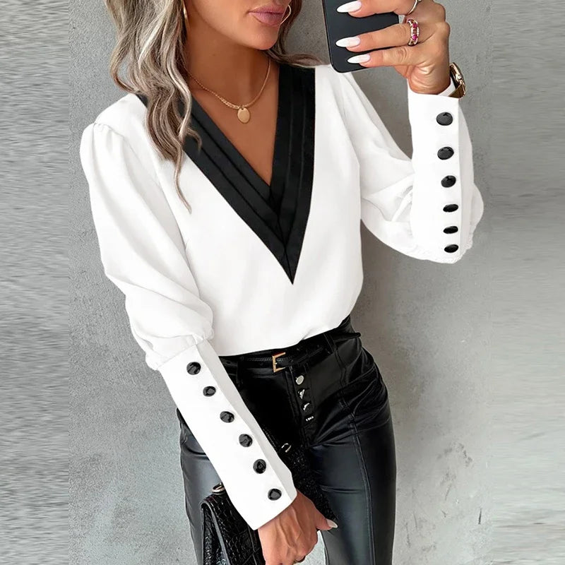 Elegante Damenbluse mit langen Ärmeln, V-Ausschnitt und Knopfleiste. Perfekt für Frühling und Herbst. Modischer Look, ideal für Freizeit und Büro.