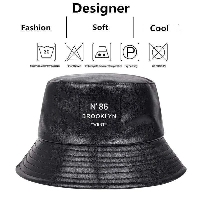 Schwarzer PU-Leder-Bucket-Hut, unisex, mit "N°86 Brooklyn" Label. Modisch, weich, ideal für Outdoor-Aktivitäten. Perfekt für Sonnenschutz.