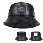 Unisex PU-Leder Eimerhut, schwarz, mit "N°86 Brooklyn" Label. Modischer Fischerhut, ideal für Outdoor-Aktivitäten und Sonnenschutz.