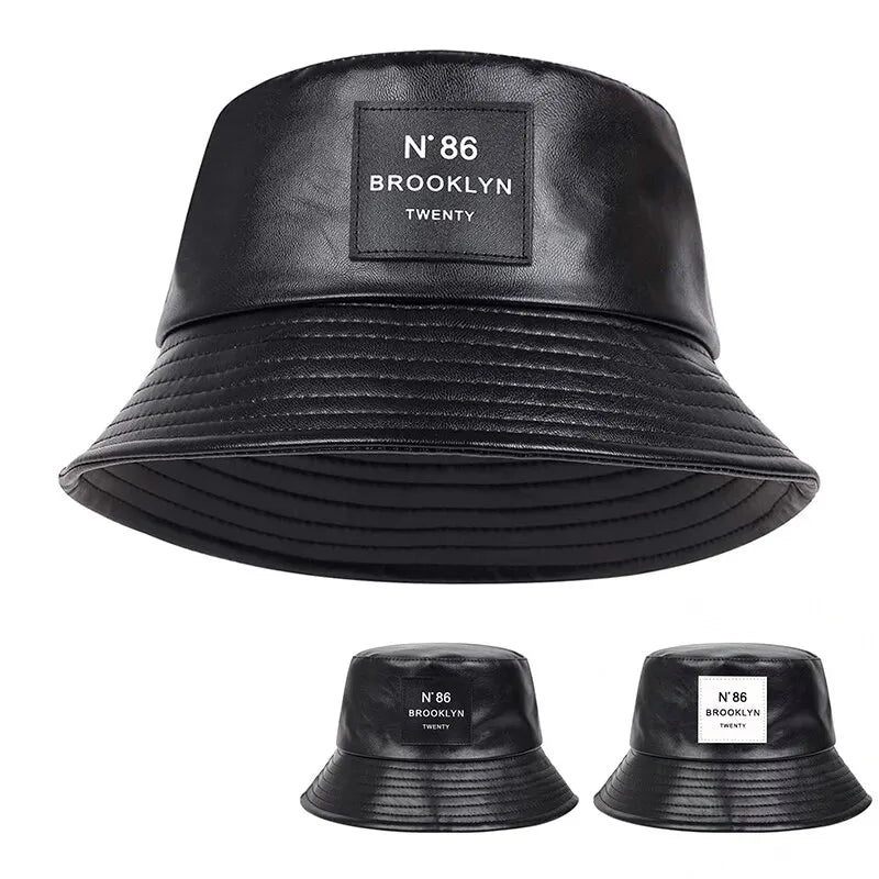 Unisex PU-Leder Eimerhut, schwarz, mit "N°86 Brooklyn" Label. Modischer Fischerhut, ideal für Outdoor-Aktivitäten und Sonnenschutz.