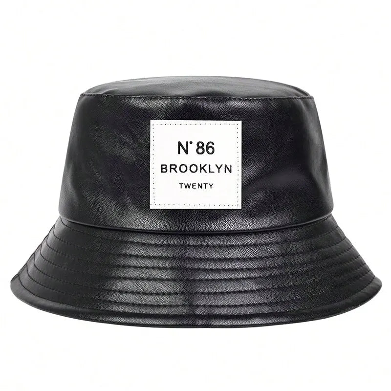 Unisex PU-Leder Fischerhut, schwarz, mit N°86 Brooklyn Label. Modischer Outdoor-Sonnenhut, ideal für Freizeit und Schutz vor Sonne.