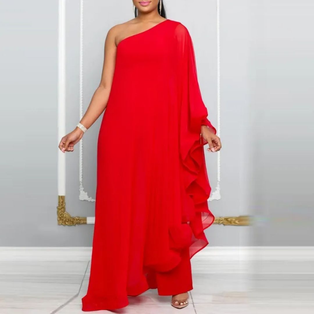 Elegantes rotes Abendkleid, asymmetrisch geschnitten, mit fließendem Stoff und Rüschen. Perfekt für formelle Anlässe und stilvolle Events.