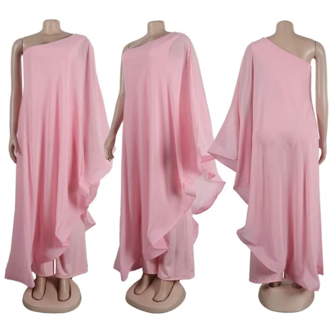Rosa asymmetrisches Kleid, fließend und elegant, ideal für Abendveranstaltungen. Perfekt für Modebewusste, die stilvolle Kleider suchen.