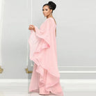 Elegantes rosa Abendkleid mit fließenden Rüschen, ideal für formelle Anlässe. Perfekt für stilvolle Mode und zeitlose Eleganz.