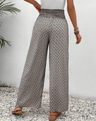 Damenhose mit geometrischem Muster, hohe Taille, weites Bein, ideal für Sommermode. Perfekt für lässige Outfits und stilvolle Freizeitlooks.