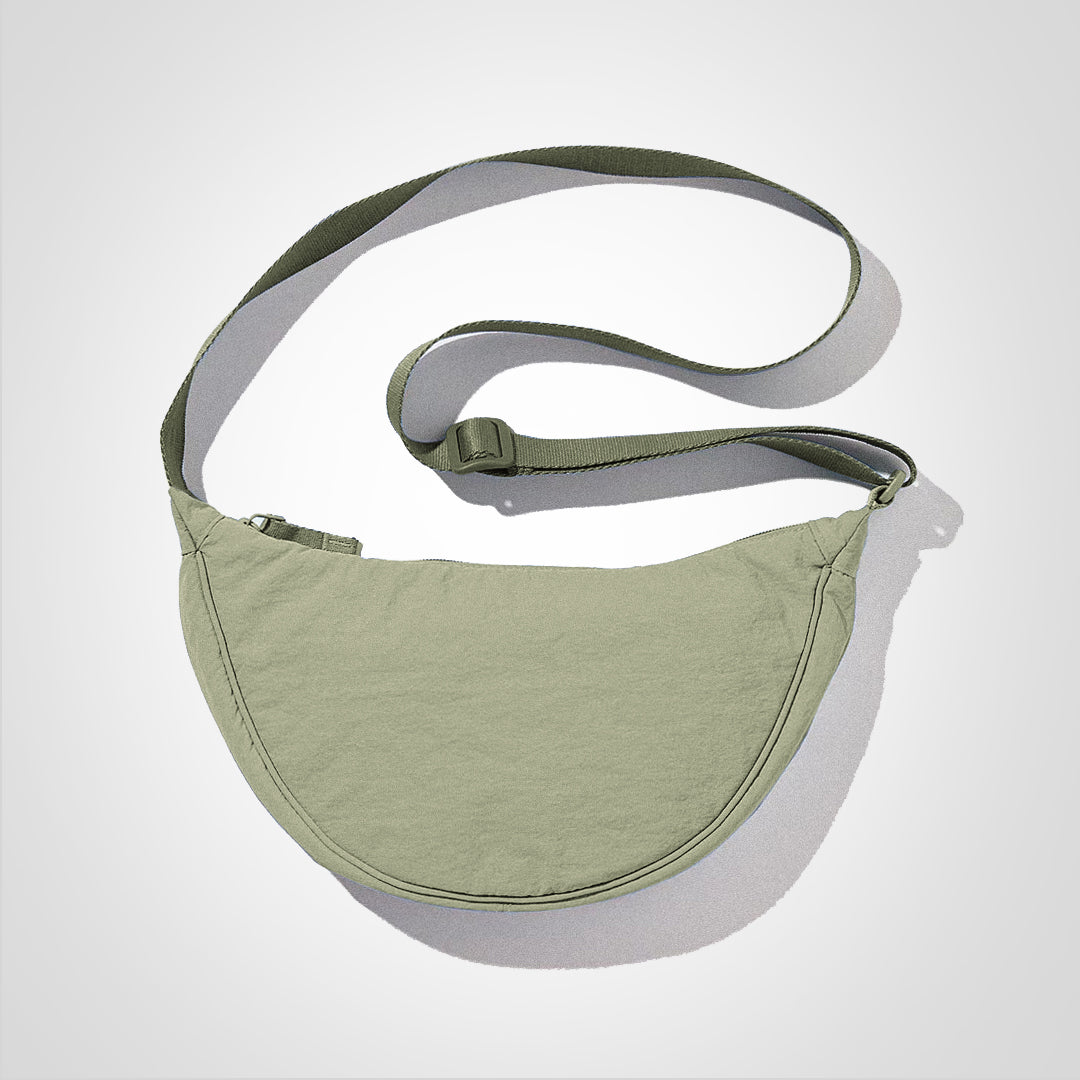 Grüne Nylon-Umhängetasche, lässig, große Kapazität, verstellbarer Riemen, ideal für Alltag und Reisen, stilvolles Accessoire.