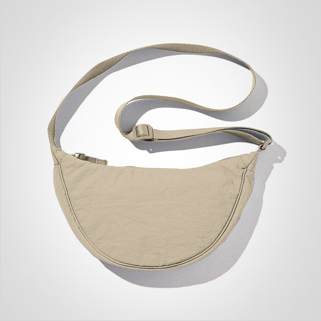 Urban Nylon Umhängetasche, beige, große Kapazität, verstellbarer Riemen, ideal für Alltag und Reisen, stilvoll und funktional.