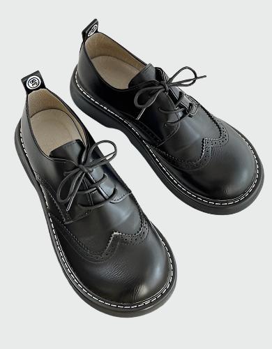 Schwarze Brogue-Oxford-Schuhe mit breiter Zehenbox, elegantes Design, ideal für Komfort und Stil, hochwertige Lederschuhe für Herren.